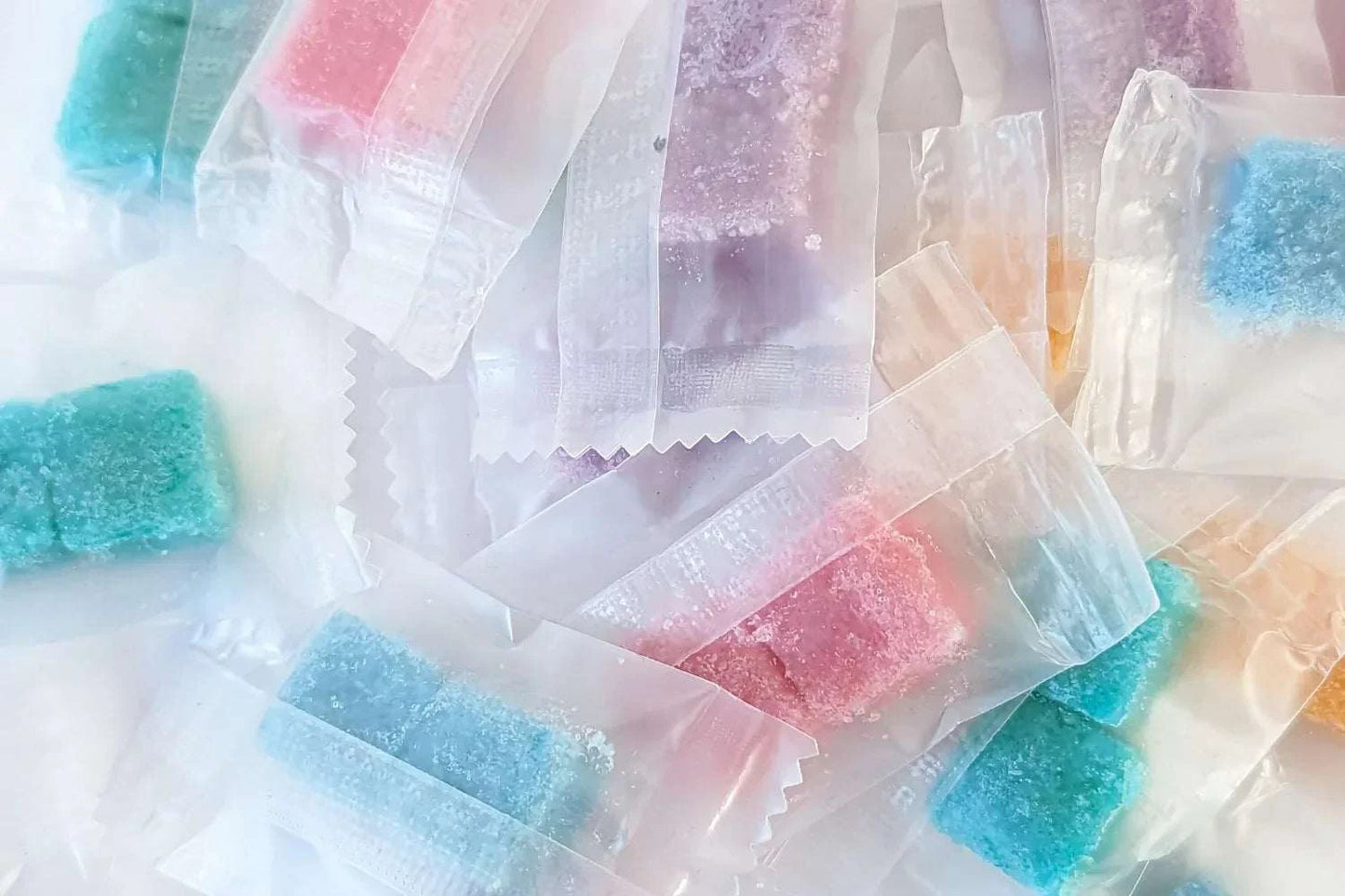 Colorful sugar scrub cubes from Christmas gift box for Cozy Nights.