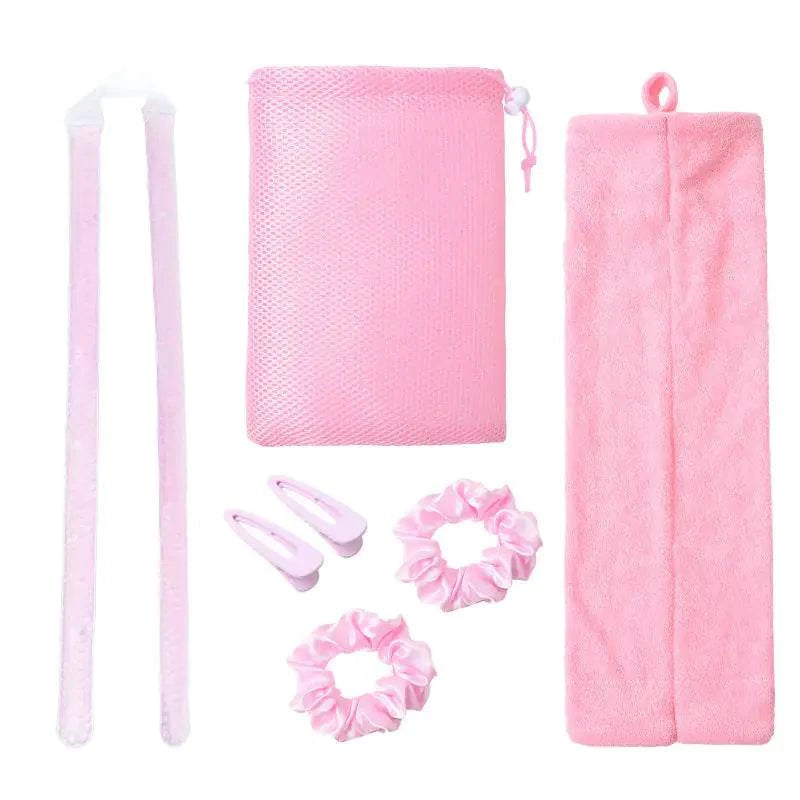 Eco-friendly gel curler kit with pink accessories for natural curls.