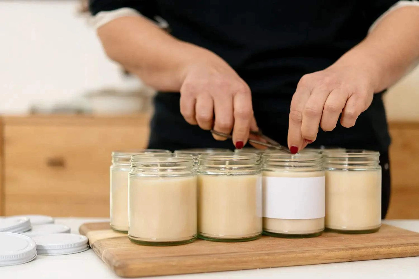 Handmade scented candles being prepared for gift set for him and her.