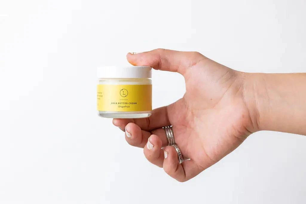 Grapefruit shea butter cream from the congratulations gift basket.