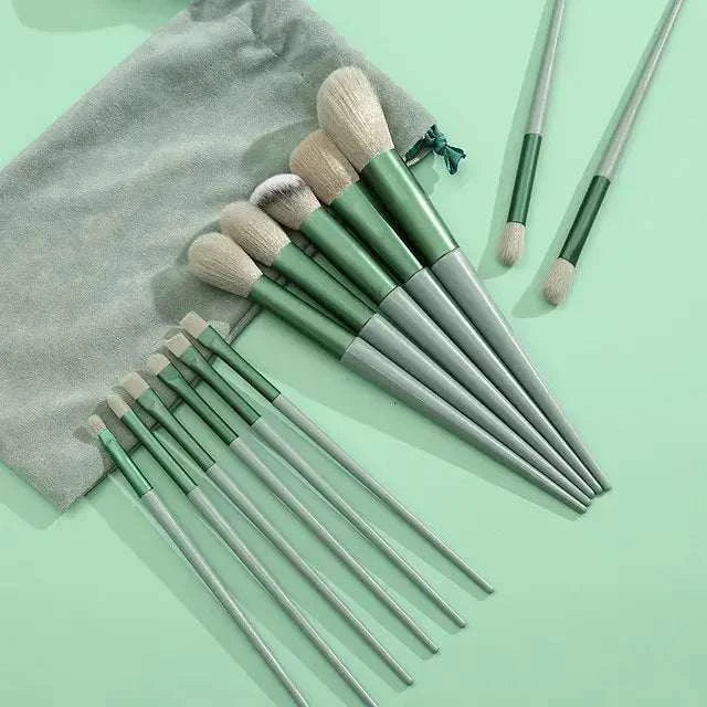 Soft fluffy makeup brushes set with sleek handles and storage pouch.