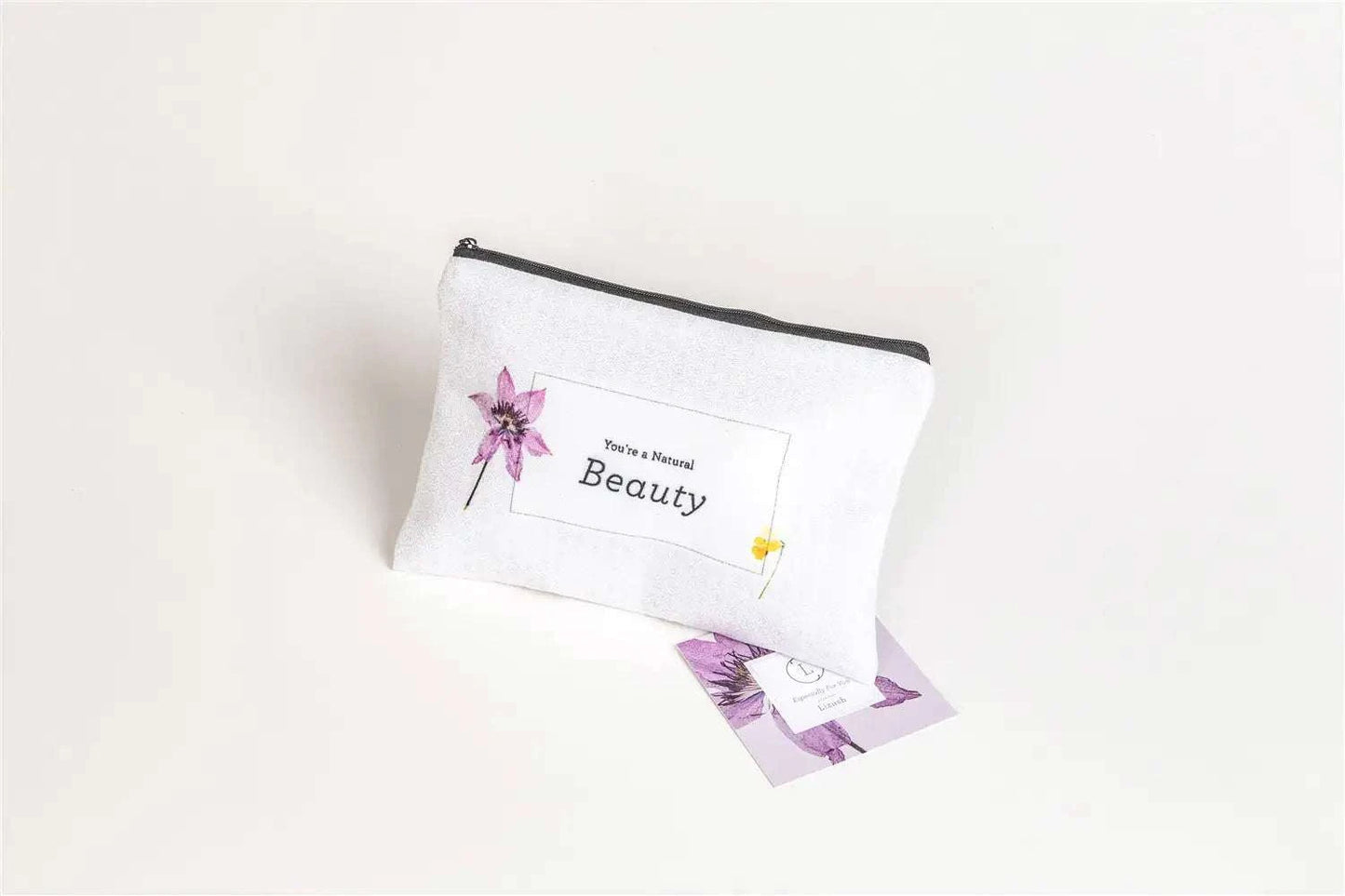 Cosmetic bag with "You're a Natural Beauty" text, from the Spa Gift Box - Natural Lavender Bath & Body Relaxing Package.