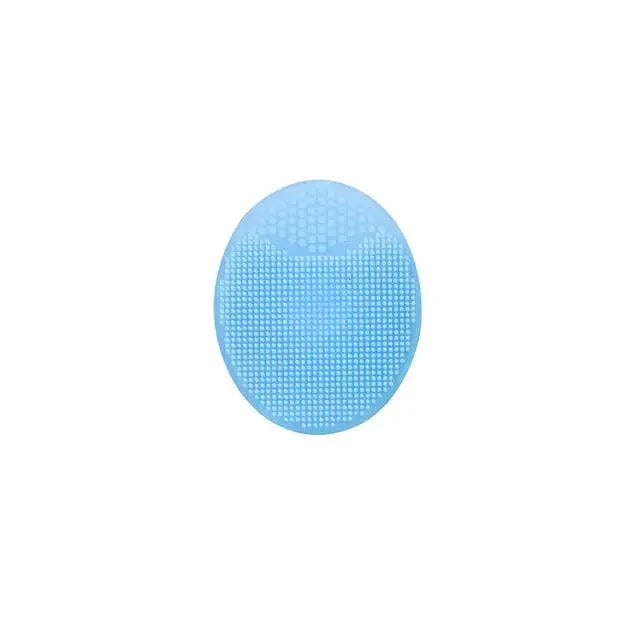 Silicone facial exfoliating cleansing brush with soft, flexible bristles for deep skin cleansing.