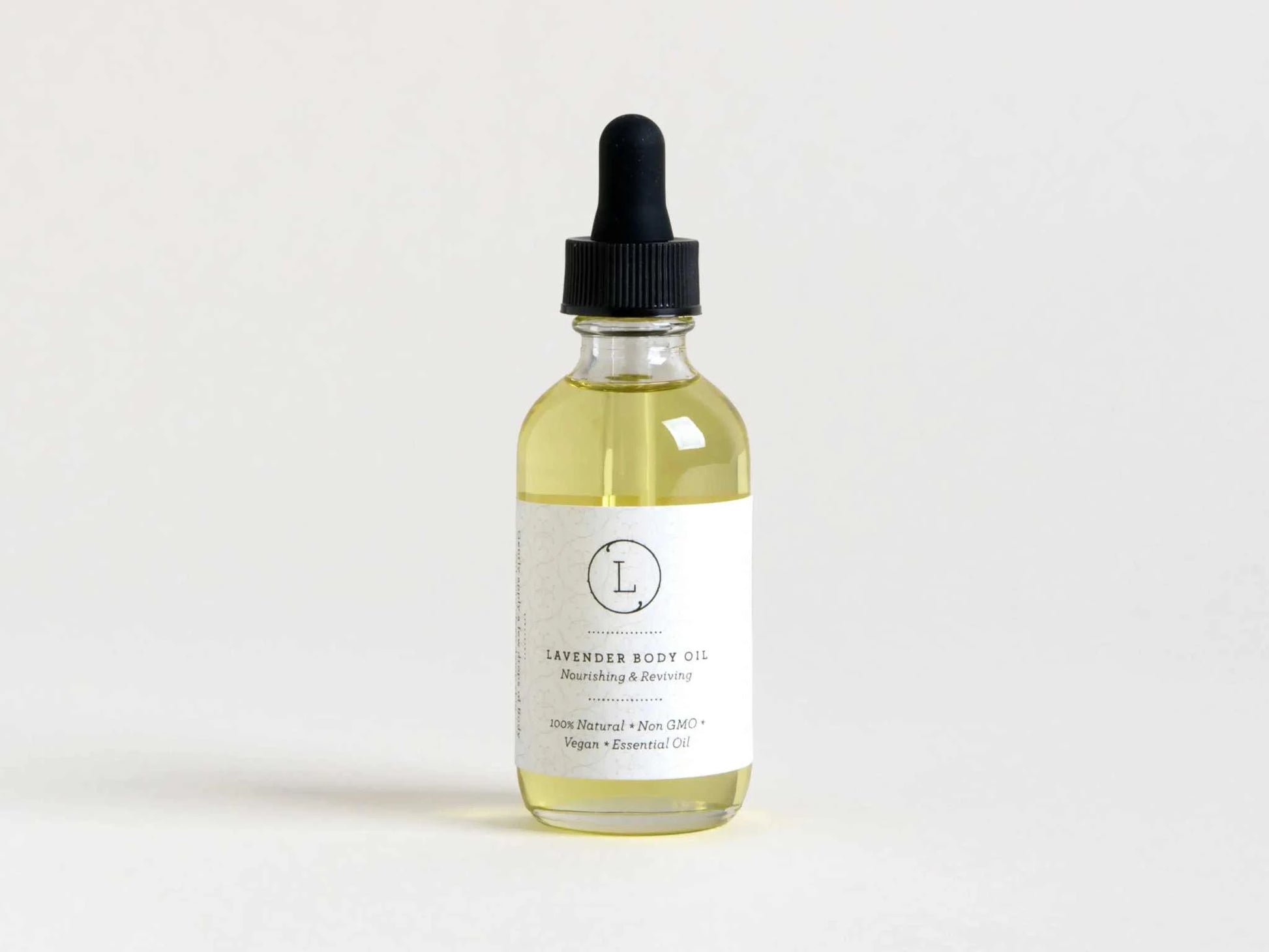 Natural lavender body oil in a glass bottle with dropper.