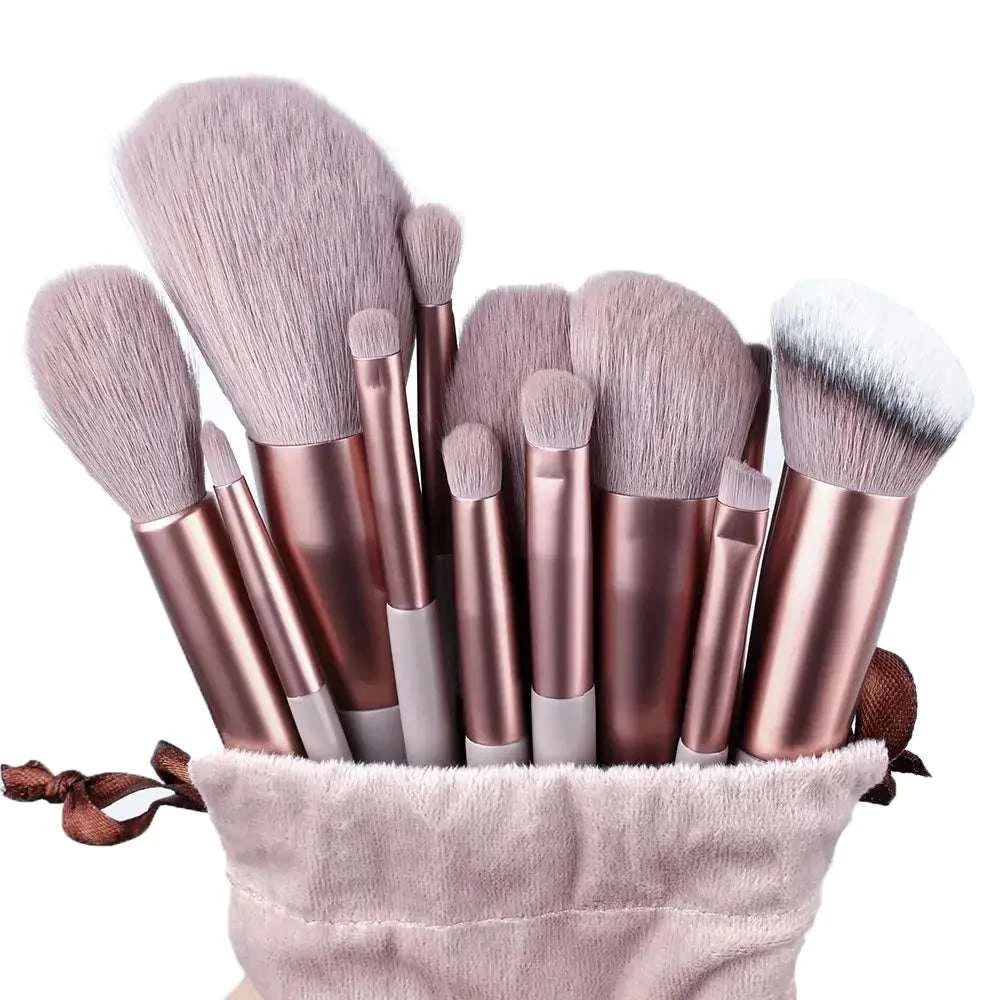Soft fluffy makeup brushes set in a plush pouch, ideal for flawless application and luxury beauty routines.