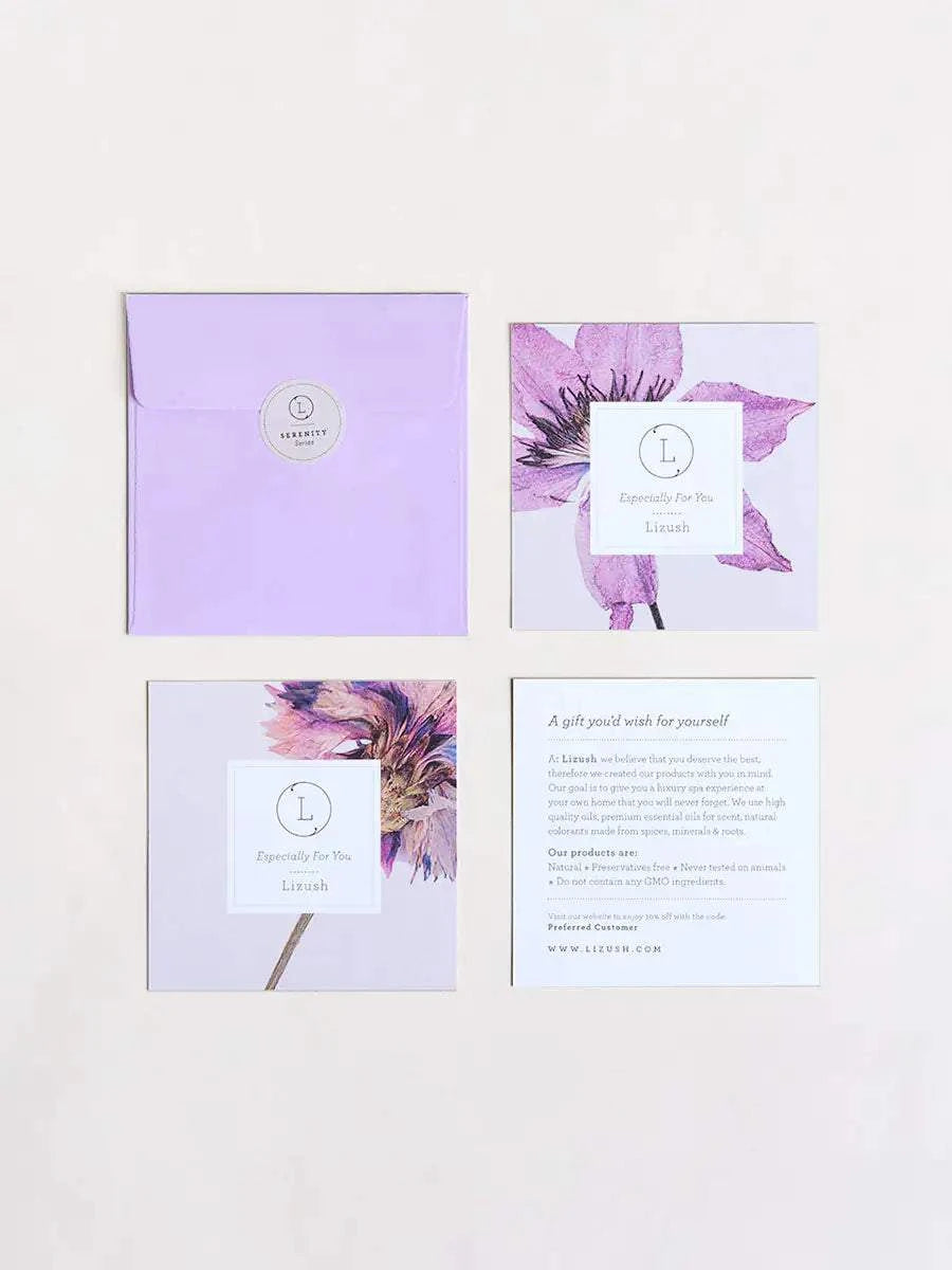 Lizush All Natural Lavender Gift Box with Shower Steamer and bath products on a floral backdrop.