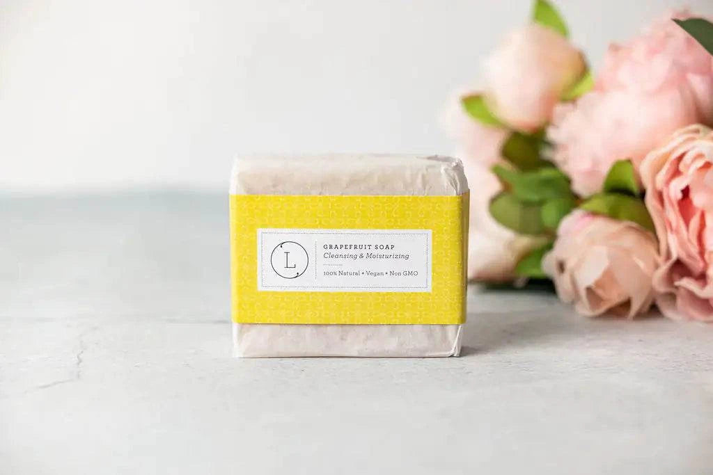 Grapefruit soap with floral background from a celebration gift box.