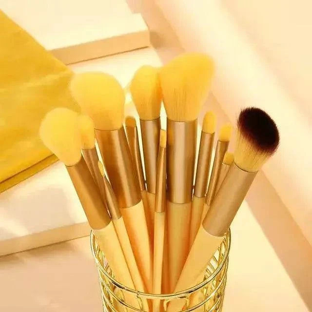 Soft fluffy makeup brushes set in a holder, ideal for flawless application and luxurious makeup results.