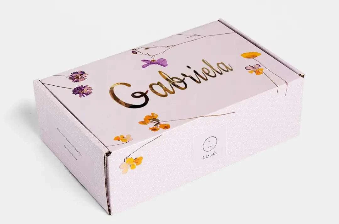 Spa Gift Box with personalized lid design containing natural lavender bath products and accessories for relaxation.