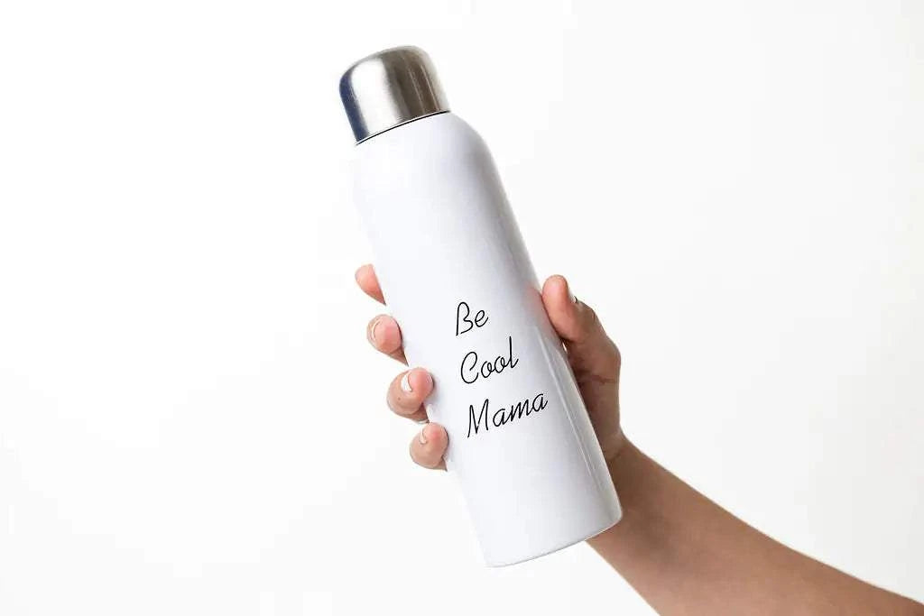 Water bottle with "Be Cool Mama" text, part of a pampering natural skincare gift for new moms.