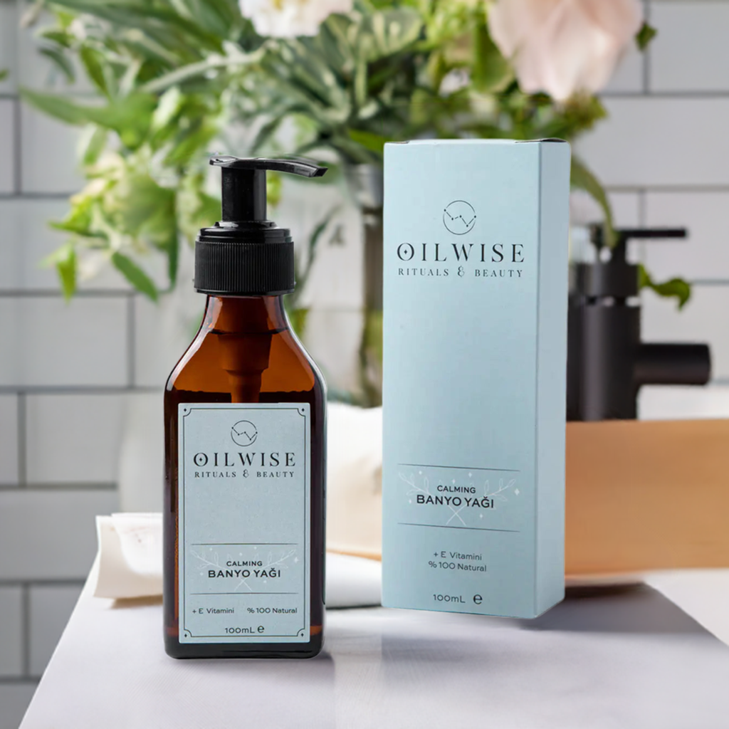 Oilwise Calming Bath Oil 100 ml bottle with box in a bathroom setting.