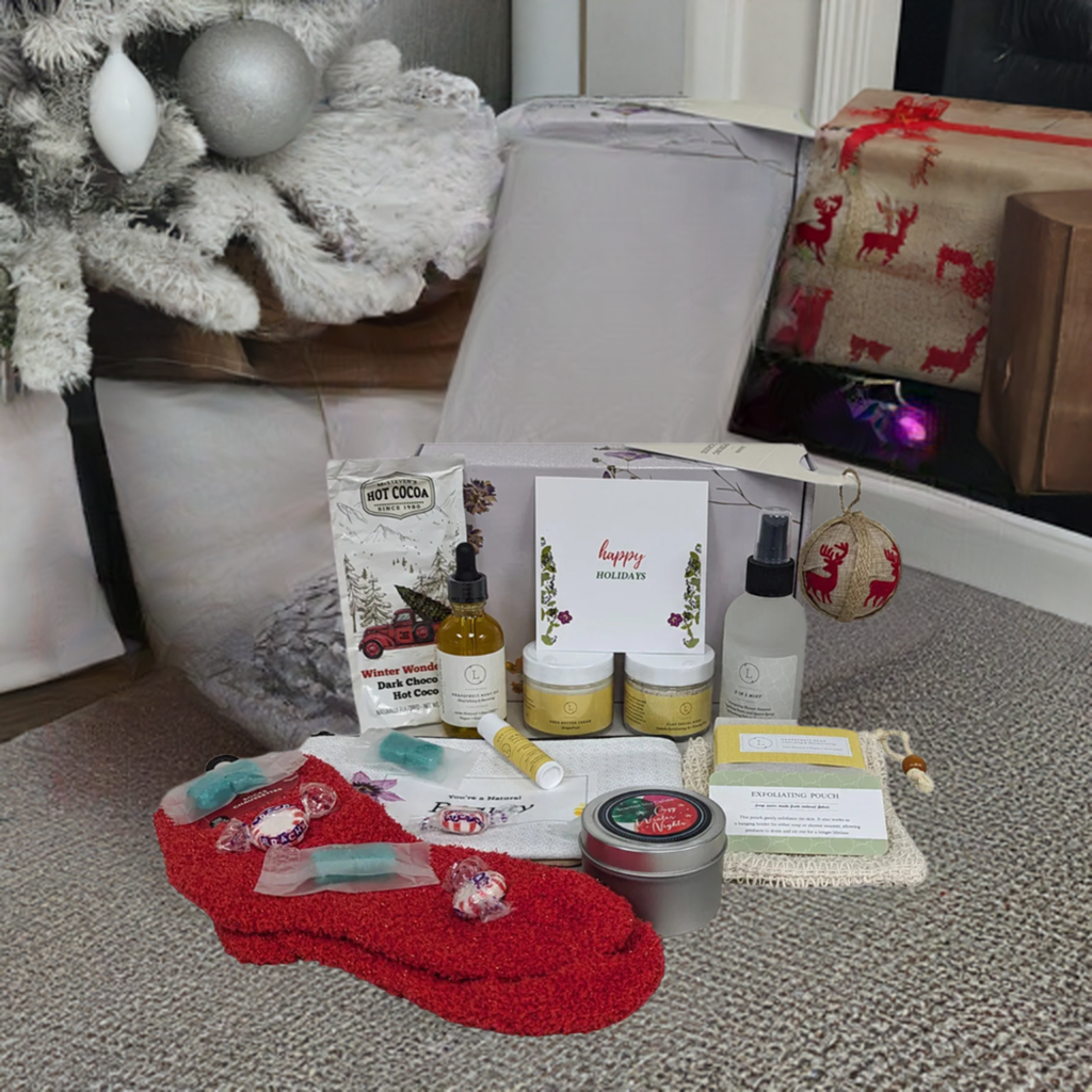 Christmas spa gift box with luxury pampering items under the tree.
