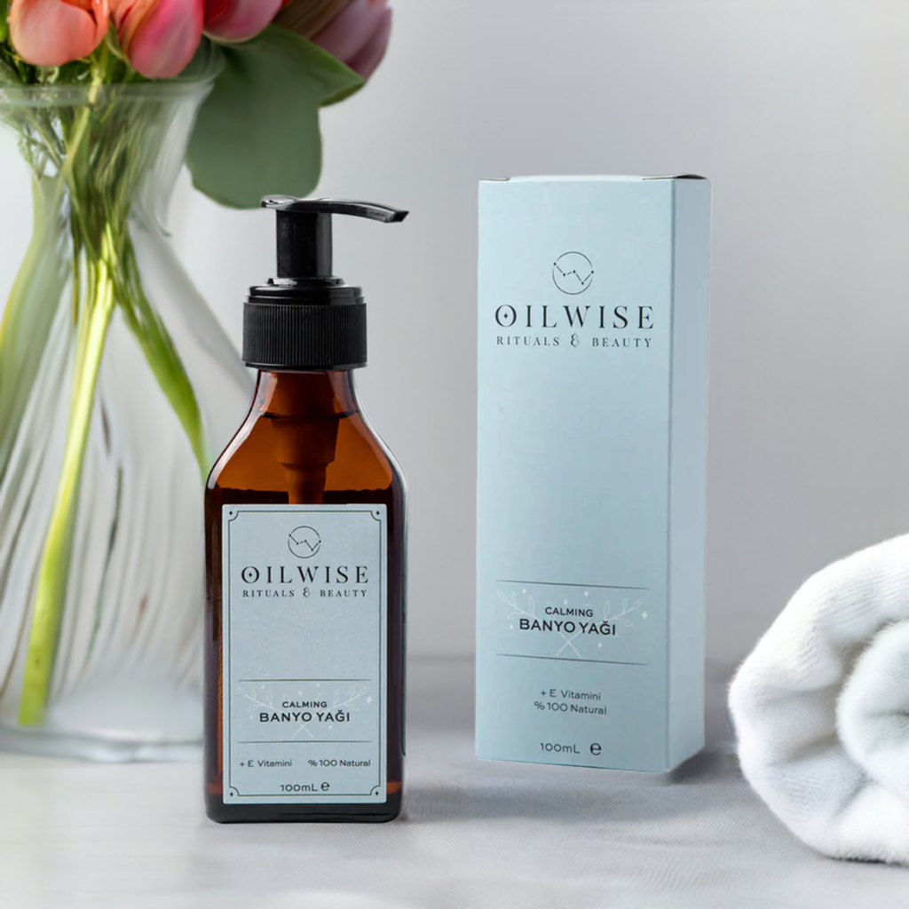 Oilwise Calming Bath Oil 100 ml bottle next to packaging, emphasizing skin health and moisture.