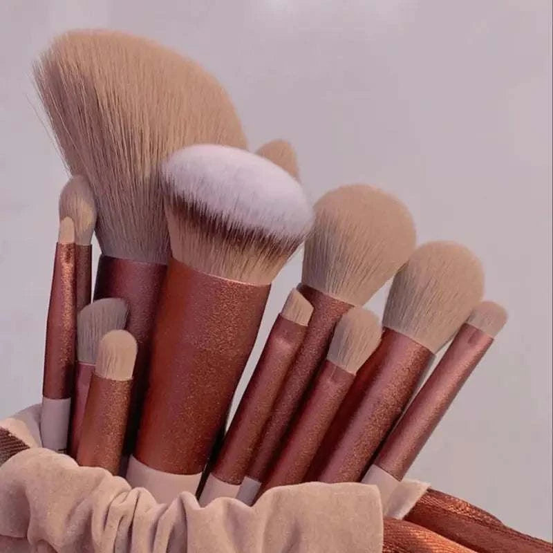 Soft fluffy makeup brushes set with rose gold handles, perfect for blending and contouring.