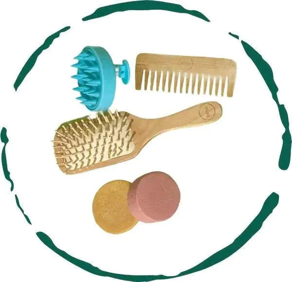 Hair care bundle with shampoo bar, conditioner bar, bamboo comb, wooden brush, and scalp massager.