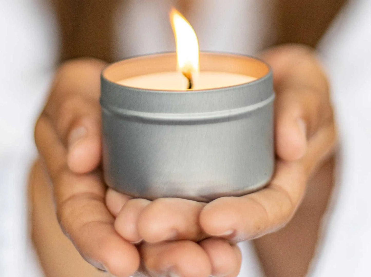 Scented soy candle in a tin from the Breast Cancer Awareness Gift Box.