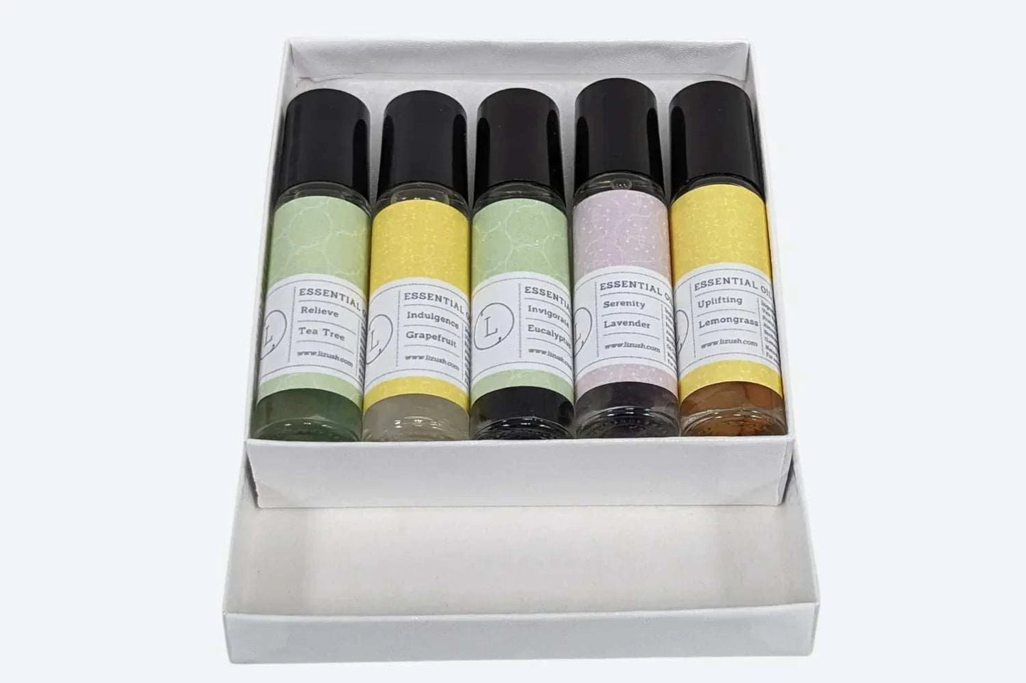 Essential Oils Roll-On Set with Crystals and CBD in a white gift box.