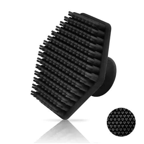 Miniature silicone facial cleaning brush with soft bristles for deep cleansing and exfoliation.