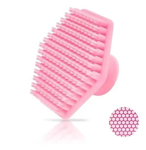 Miniature silicone facial cleaning brush with soft bristles for deep cleansing and exfoliation.