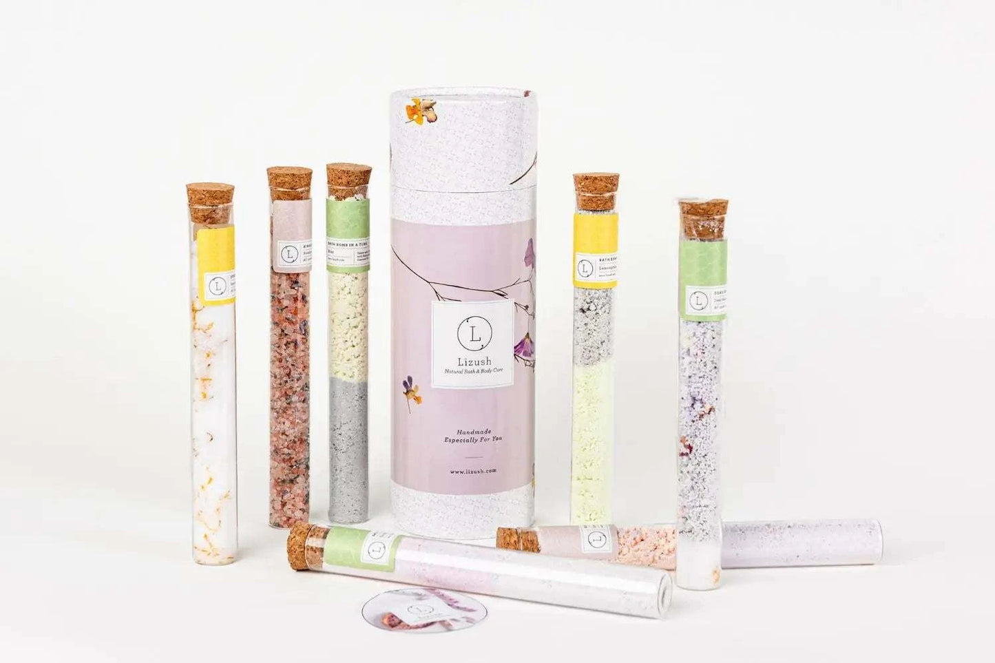 7 glass tubes of natural bath salts and bombs for luxurious bath experience.