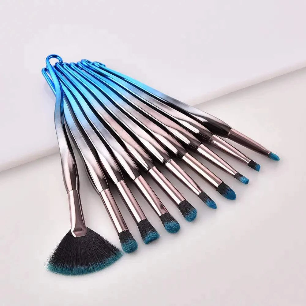 Blue Ocean Makeup Brush Set with elegant blue handles and soft bristles arranged on a white surface.