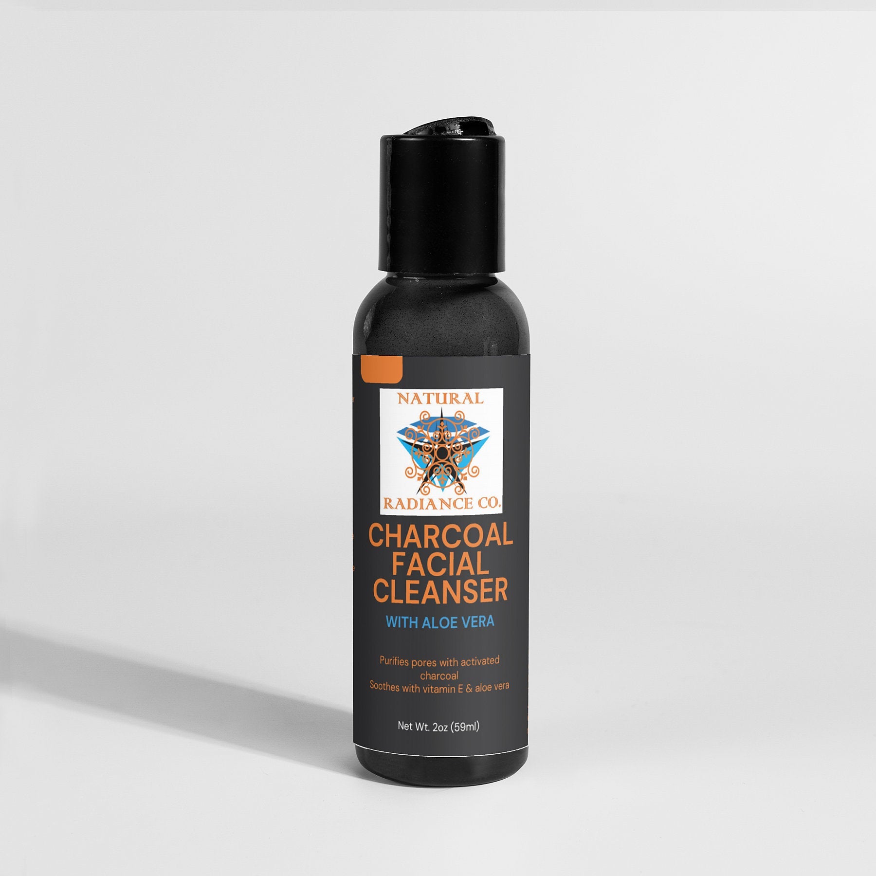 Charcoal Facial Cleanser bottle with aloe vera, designed for gentle cleansing.
