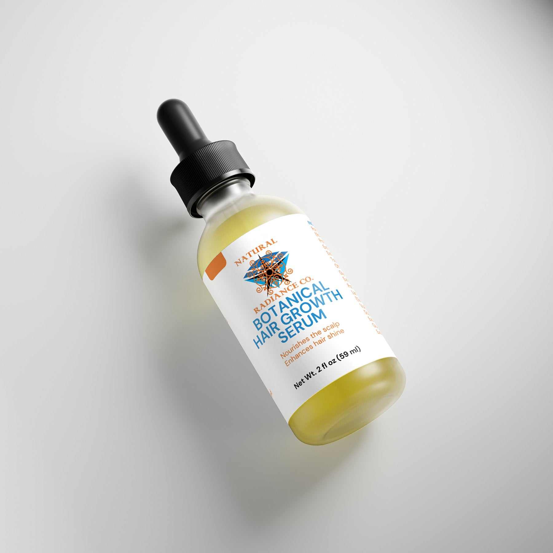 Botanical Hair Growth Serum bottle with black dropper on a light background.