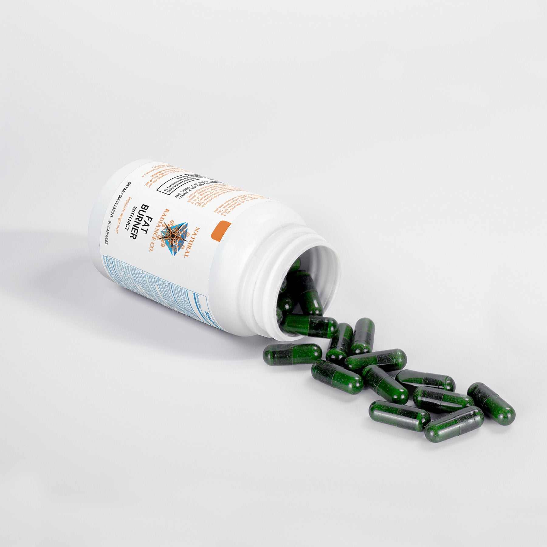 Fat Burner with MCT capsules spilling from bottle on white background.