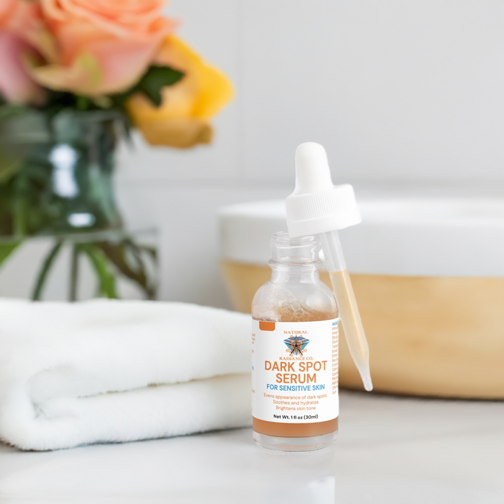 Dark Spot Serum for Sensitive Skin in clear glass bottle with dropper, placed next to a white towel and flowers.