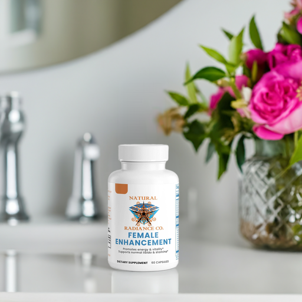 Natural Radiance Co. Female Enhancement supplement bottle on a bathroom counter with flowers in the background.